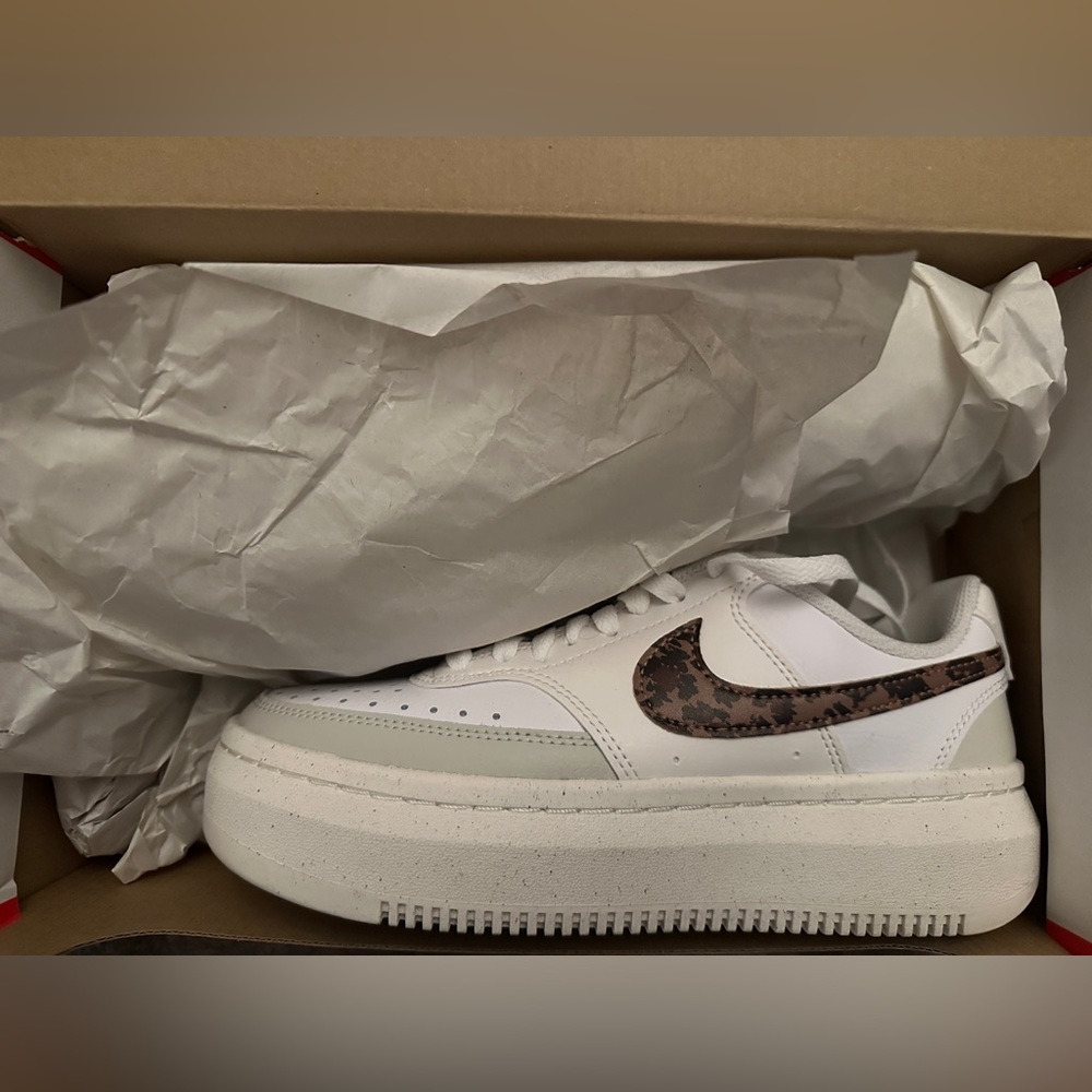 Brand new, never worn, still in box